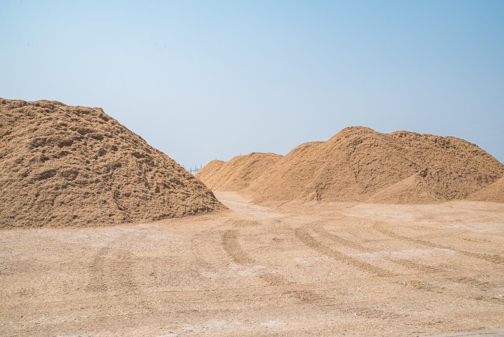 Piles of biomass drying in the sun