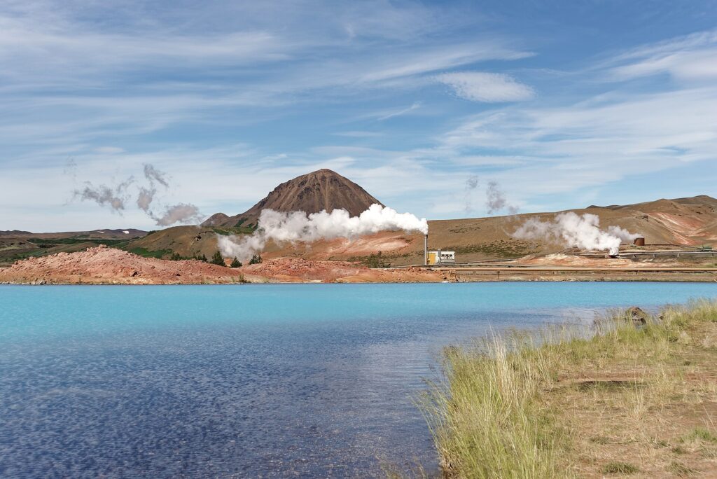 Bjarnarflag geothermal power station beside a blue lake in Iceland